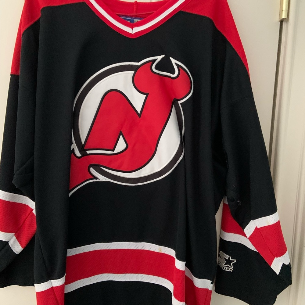 Vintage NJ Devils hockey jersey.  Starter brand, size M.